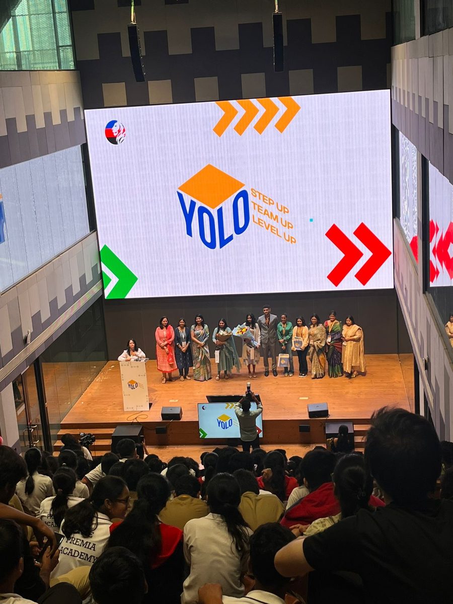 YOLO Summit stage — speakers and students at a past edition